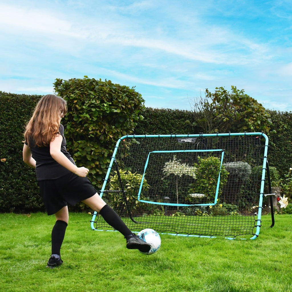 PrecisionPLAY Mega Rebounder in use with girl playing football