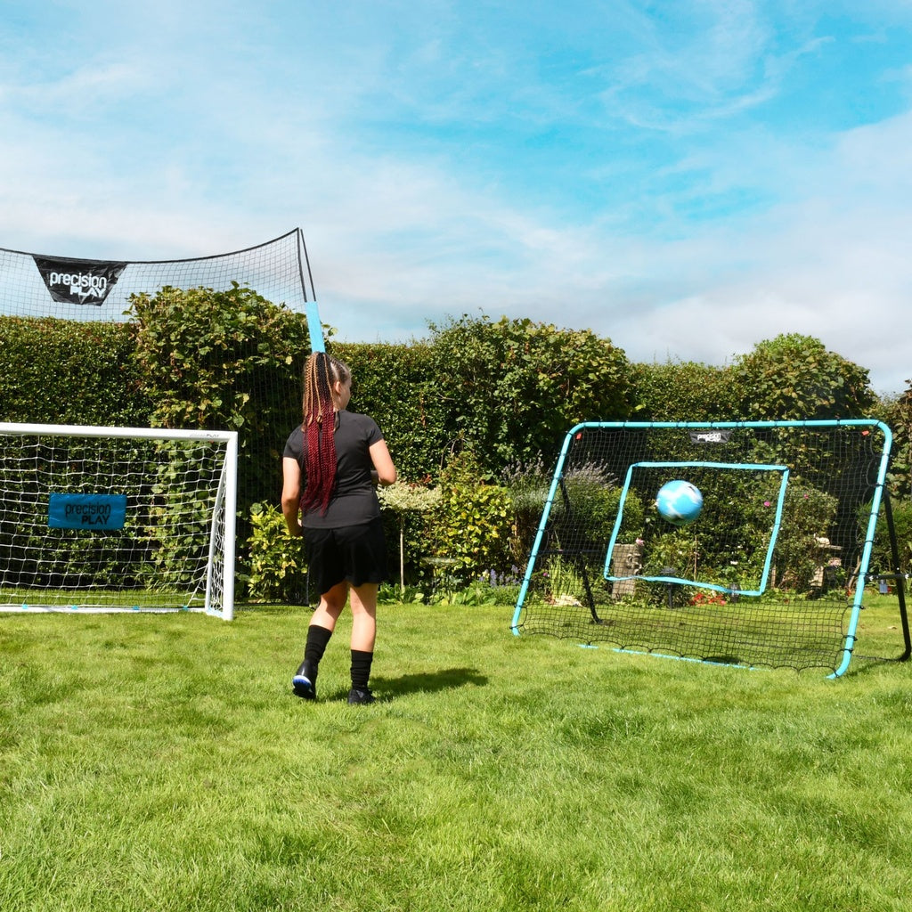 PrecisionPLAY Mega Rebounder in use along side goal and net